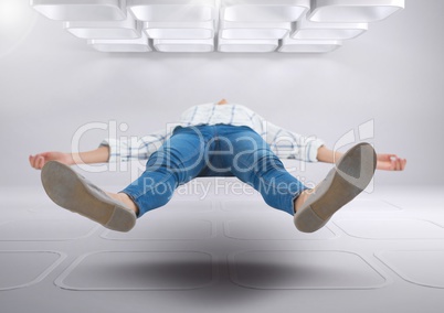 Businessman floating in futuristic room