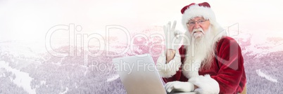 Santa Claus in Winter with laptop