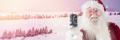 Santa Claus in Winter with phone