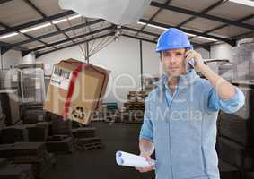 man with box in warehouse, transition
