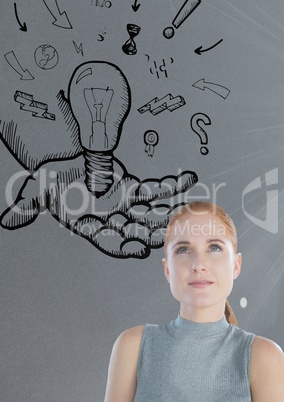 man looking up at light bulb idea