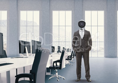 Businessman with CCTV head at office