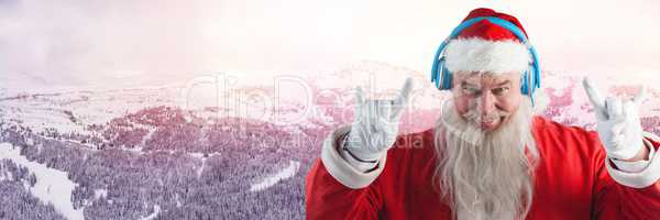 Santa with Winter landscape and DJ party headphones