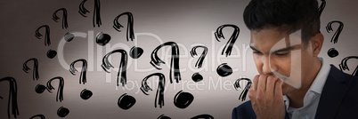 frustrated man with question marks
