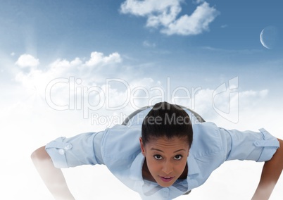 Businesswoman in clouds