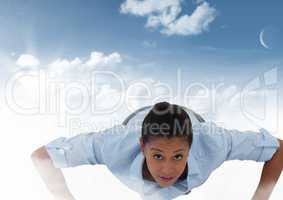 Businesswoman in clouds