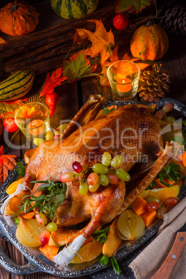 Christmas goose with pumpkin and fruit filling