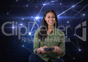 Businesswoman playing with computer game controller