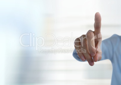 Hand interacting and pointing with bright background