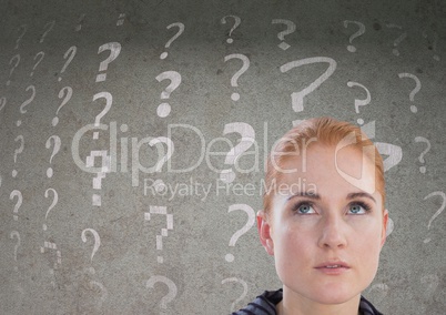 woman looking up at question mark