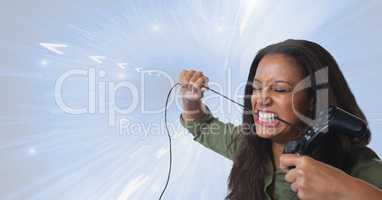 woman frustrated playing with computer game controller with bright background