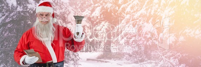 Santa Claus in Winter ringing bell