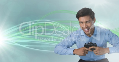 Businessman playing with computer game controller with curved lines background