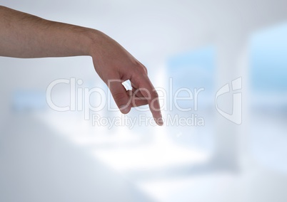 Hand interacting and pointing with bright background