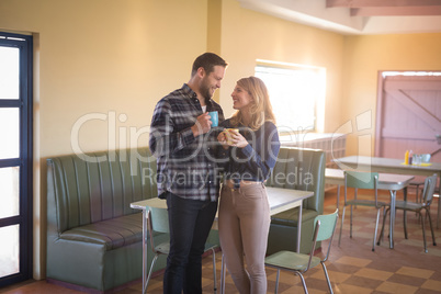 Couple having coffee in restaurant