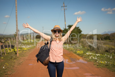 Woman with her backpack on a sunny day