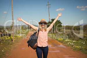 Woman with her backpack on a sunny day