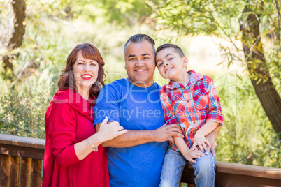 Mixed Race Caucasian and Hispanic Family At The Park.