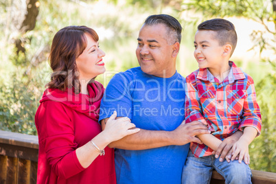 Mixed Race Caucasian and Hispanic Family At The Park.