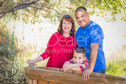 Mixed Race Caucasian and Hispanic Family At The Park.