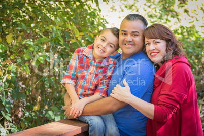 Mixed Race Caucasian and Hispanic Family At The Park.