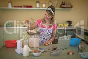 Waitress preparing food in restaurant