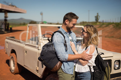 Couple embracing each other on a sunny day