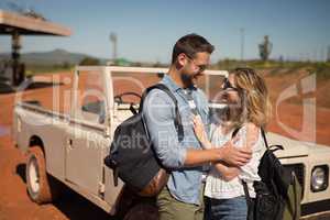 Couple embracing each other on a sunny day