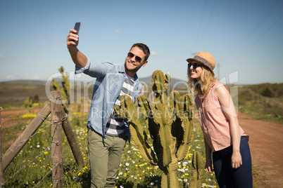 Couple taking selfie with mobile phone