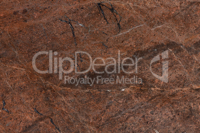 Red granite texture background, close up of precious stone.