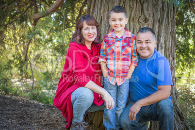 Mixed Race Caucasian and Hispanic Family At The Park.