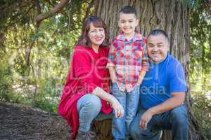 Mixed Race Caucasian and Hispanic Family At The Park.