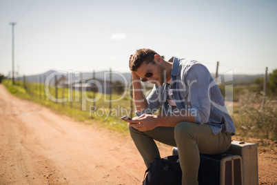 Man using mobile on a sunny day