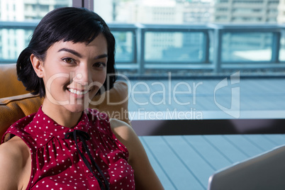 Female executive using laptop Female executive using laptop