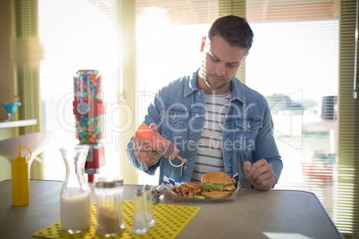 Man having meal in restaurant