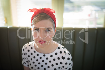 Woman relaxing in restaurant