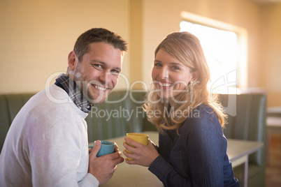 Couple having coffee in restaurant