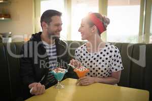 Couple romancing in restaurant