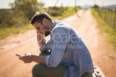 Man using mobile on a sunny day