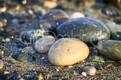 Sea stones by the sea. Reference picture
