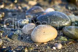 Sea stones by the sea. Reference picture