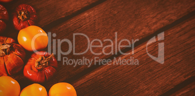 Close up of candies with small pumpkins on table