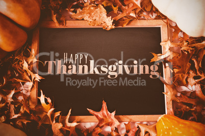 Composite image of digitally generated image of happy thanksgiving text