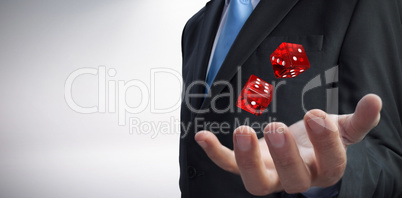 Composite image of businessman showing his empty hand