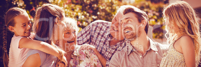 Family laughing in back yard