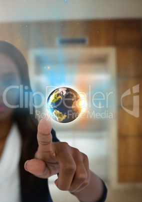 World globe and Businesswoman touching air in front of elevator