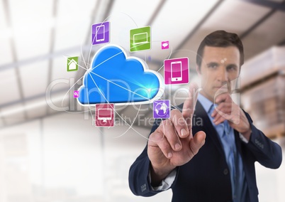 Cloud app interface and Businessman touching air in front of warehouse