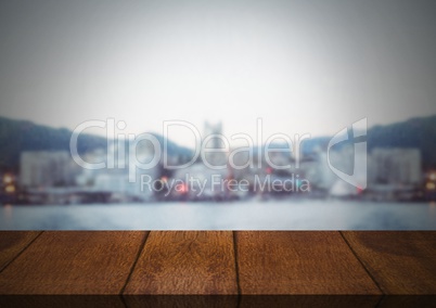 Wooden floor with Winter city background