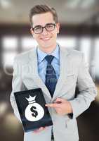 Man holding tablet with money bag icon