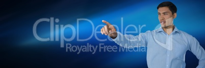 Businessman pointing touching air in front of blue background